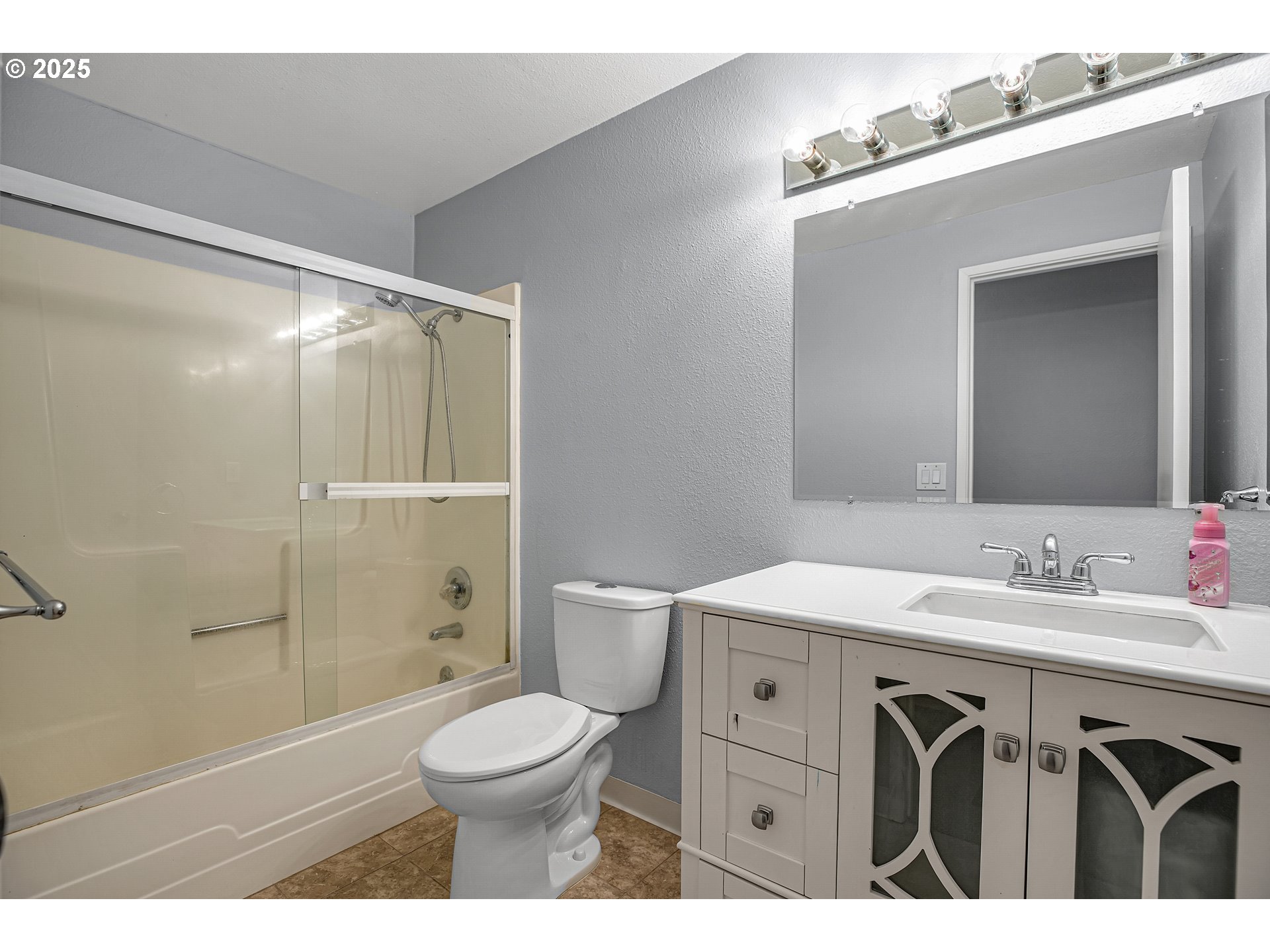 22486 South Redland Road Estacada, OR 97023 - Photo 34 of 46 a bathroom with a sink a toilet a mirror and shower