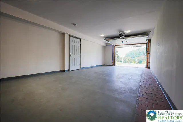 a open kitchen with a table and chairs