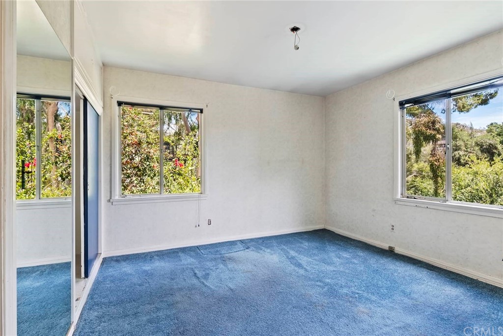1620 Puebla Drive Glendale, CA 91207 - Photo 23 of 34 an empty room with windows