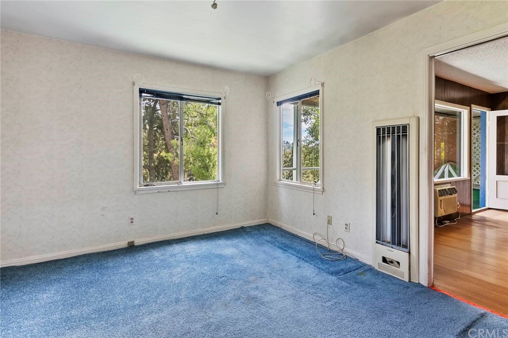 1620 Puebla Drive Glendale, CA 91207 - Photo 24 of 34 an empty room with windows