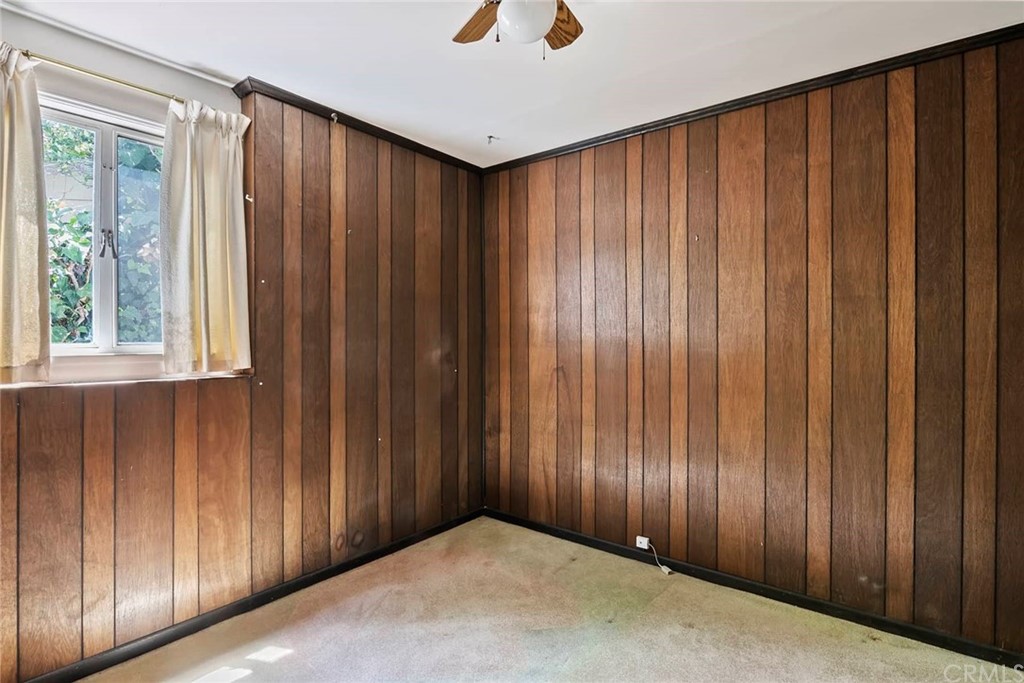 1620 Puebla Drive Glendale, CA 91207 - Photo 28 of 34 a view of a closet with wooden walls