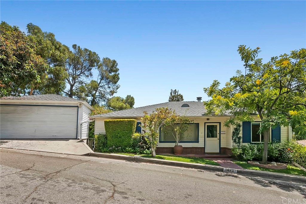 1620 Puebla Drive Glendale, CA 91207 - Photo 4 of 34 front view of a house with a street