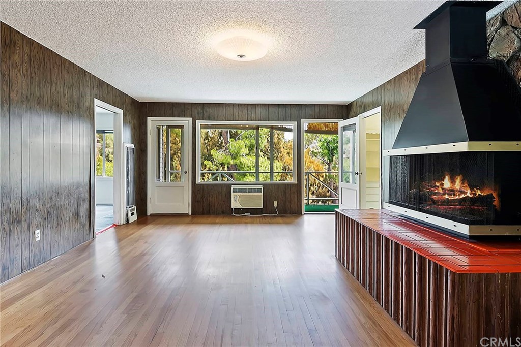1620 Puebla Drive Glendale, CA 91207 - Photo 7 of 34 a living room with furniture and a fireplace