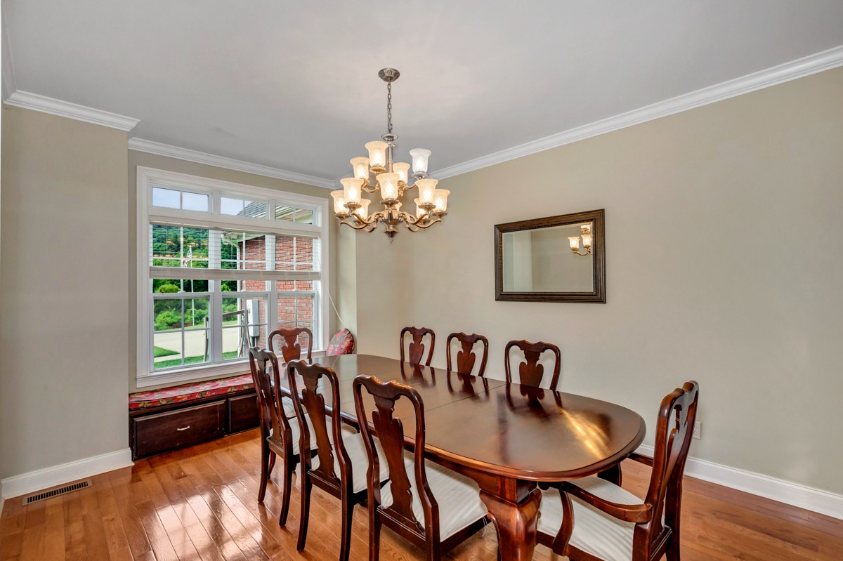 7388 Prospect Road Prospect, TN 38477 - Photo 14 of 46 a dining room with furniture a chandelier and window
