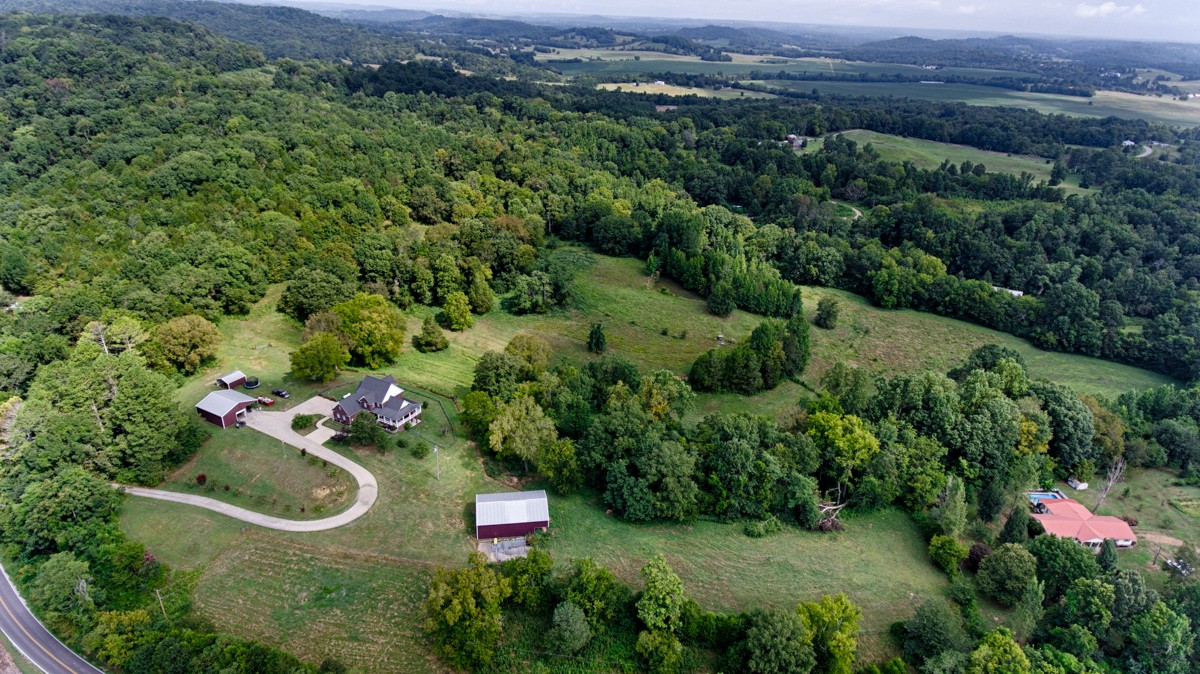 7388 Prospect Road Prospect, TN 38477 - Photo 46 of 46 an aerial view of a house with a yard