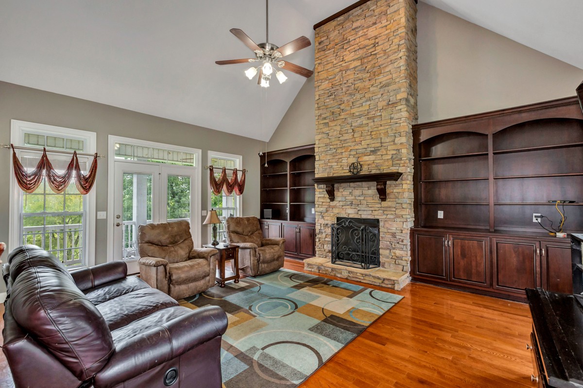 7388 Prospect Road Prospect, TN 38477 - Photo 8 of 46 a living room with furniture fireplace and flat screen tv