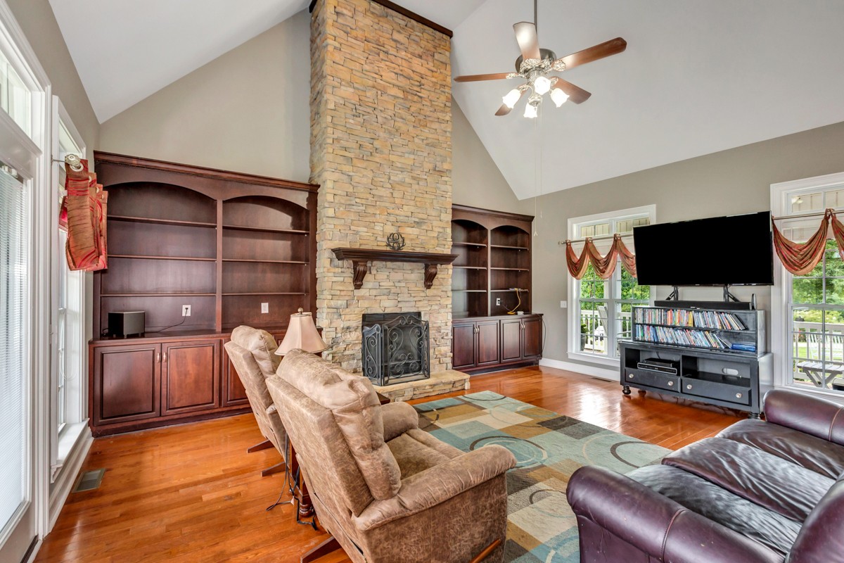 7388 Prospect Road Prospect, TN 38477 - Photo 9 of 46 a living room with furniture and a flat screen tv