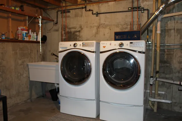 a utility room with dryer and washer