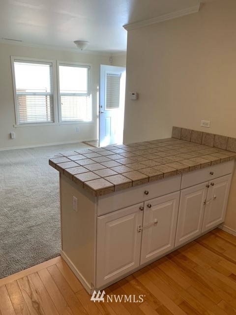 35215 Southeast Ridge Street Snoqualmie, WA 98065 - Photo 11 of 25 a view of cabinets and wooden floor