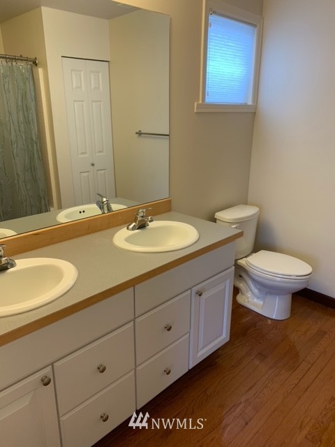 35215 Southeast Ridge Street Snoqualmie, WA 98065 - Photo 16 of 25 a bathroom with a granite countertop sink and a mirror
