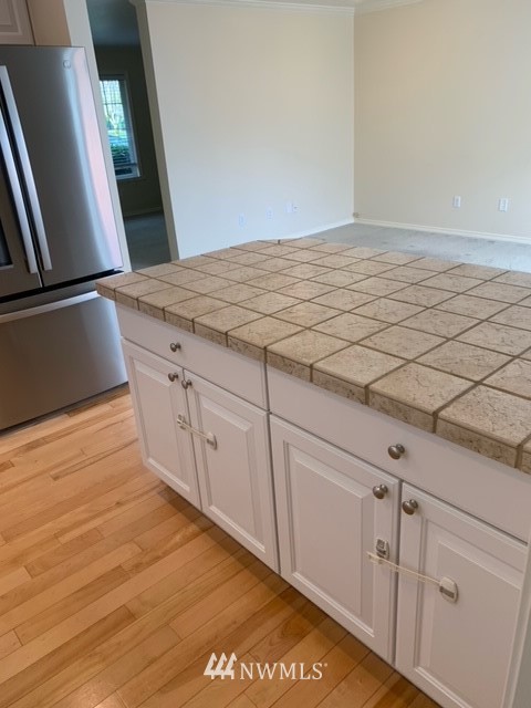 35215 Southeast Ridge Street Snoqualmie, WA 98065 - Photo 6 of 25 a view of a kitchen with wooden floor