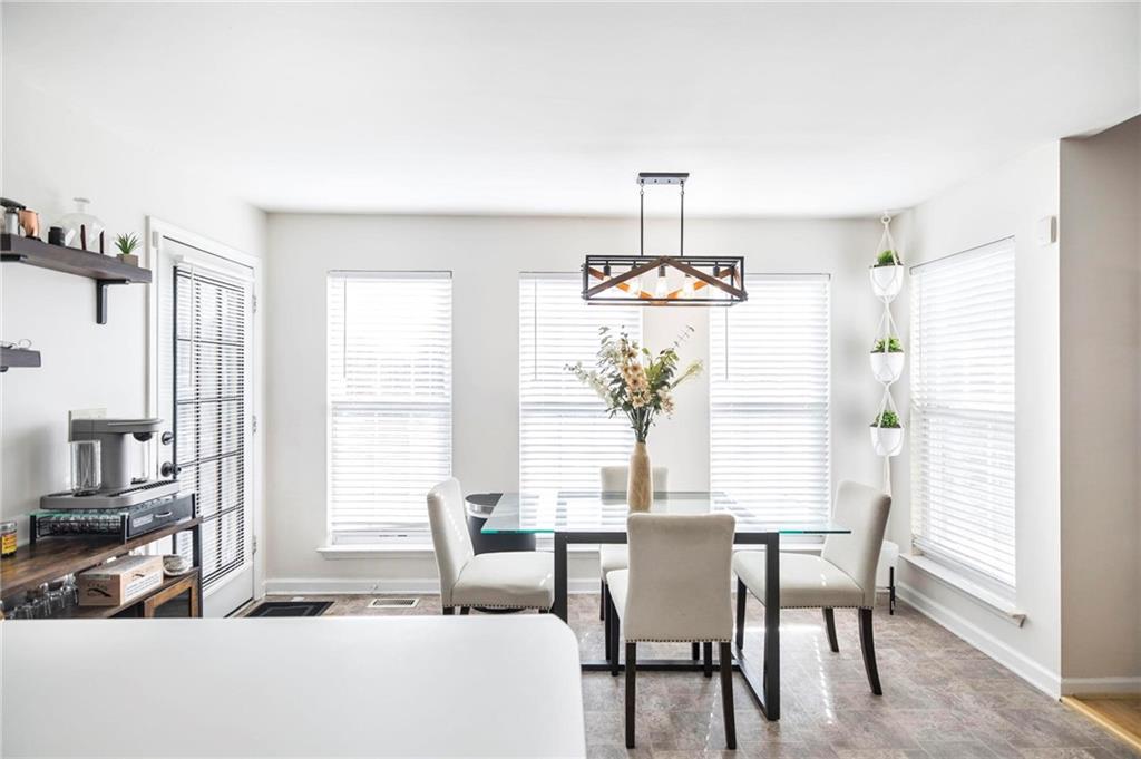 306 Jason Court Macon, GA 31216 - Photo 12 of 30 a view of a dining room with furniture window and outside view