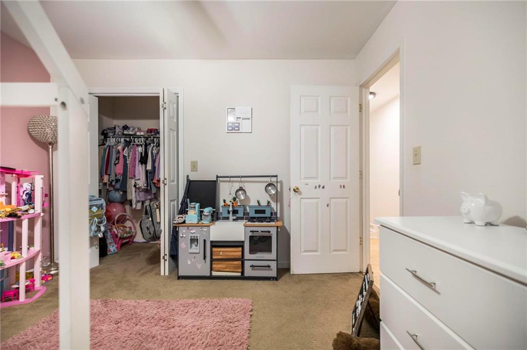 306 Jason Court Macon, GA 31216 - Photo 21 of 30 a view of a bedroom with closet and cabinet