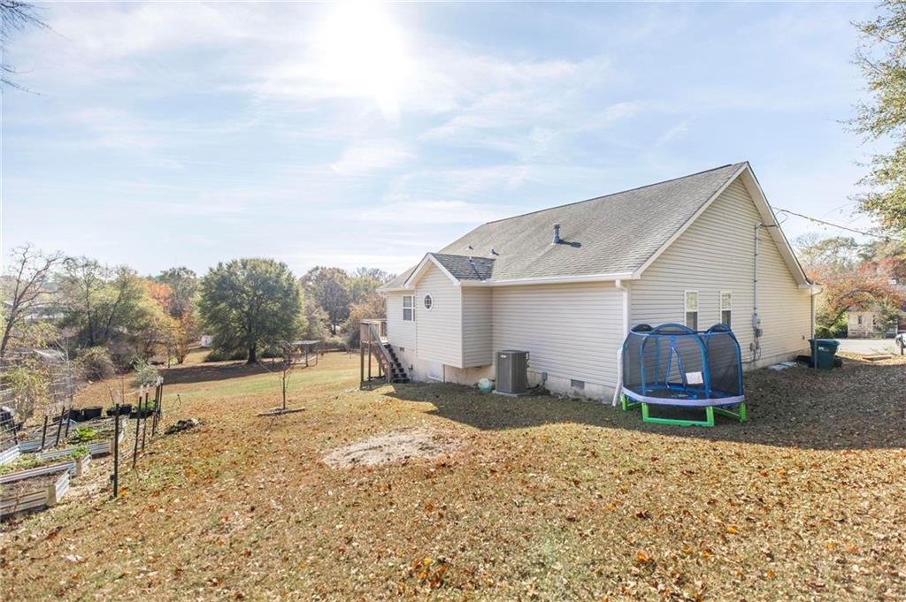 306 Jason Court Macon, GA 31216 - Photo 26 of 30 a view of a house with a backyard