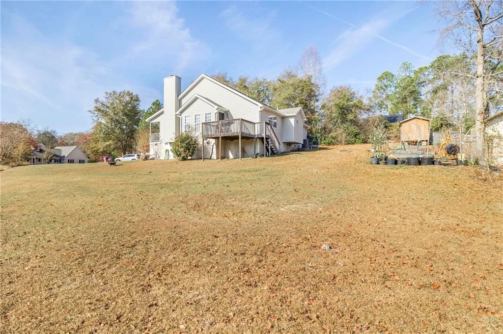 306 Jason Court Macon, GA 31216 - Photo 28 of 30 a front view of a house with a yard and garage