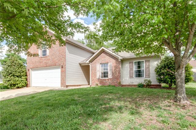 1920 Portway Road Spring Hill, TN 37174 - Photo 1 of 10 a view of a house with yard and a garden