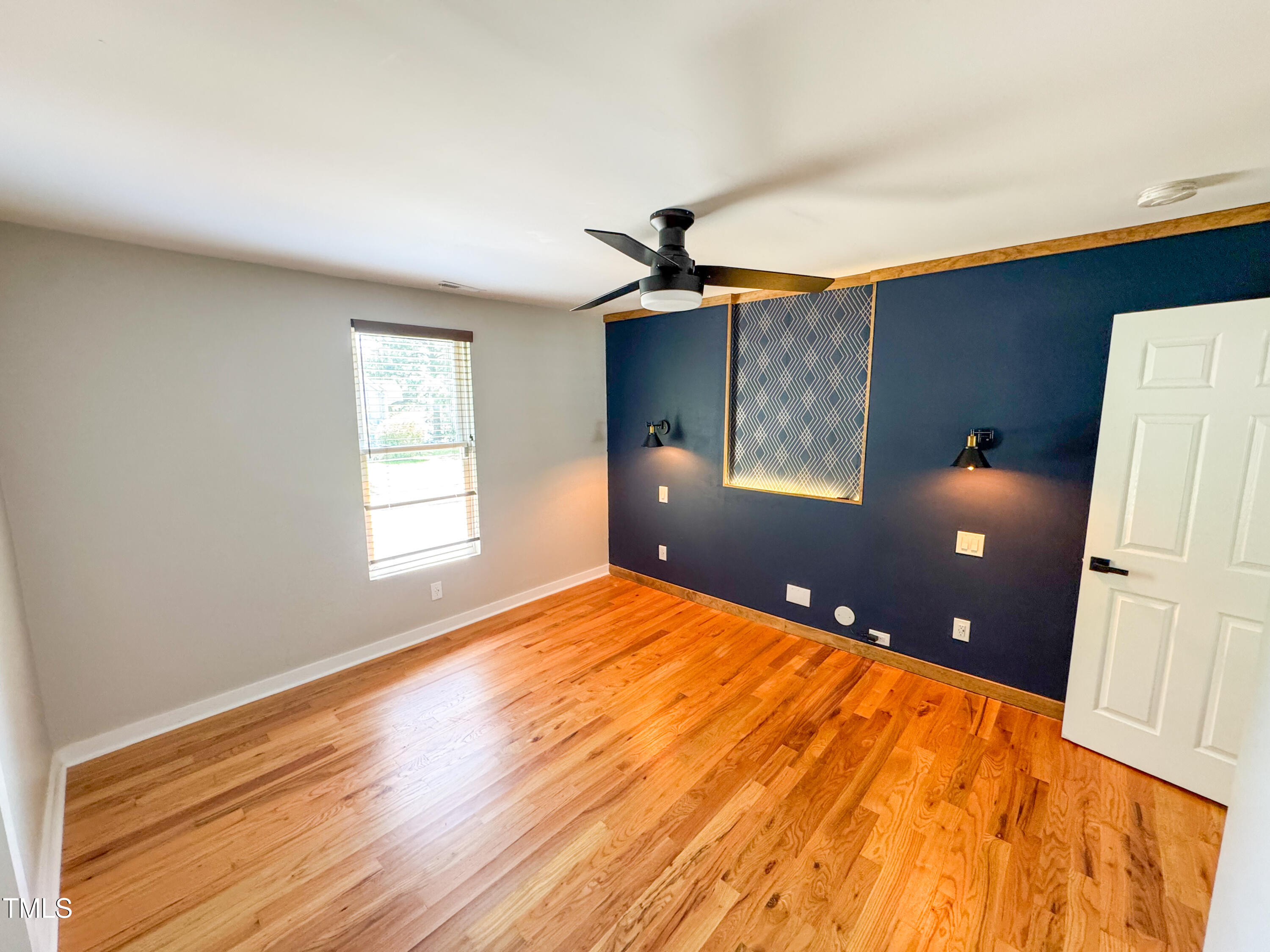 1100 Chester Street Durham, NC 27701 - Photo 14 of 29 a bedroom with a bed and a window