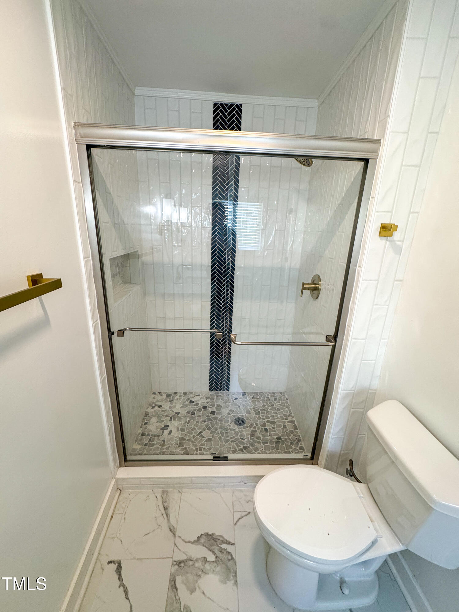 1100 Chester Street Durham, NC 27701 - Photo 23 of 29 a white toilet sitting next to a shower