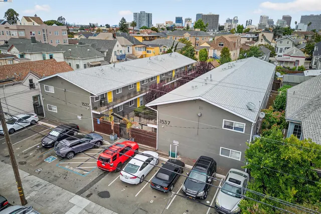 an aerial view of a city with lots of residential buildings