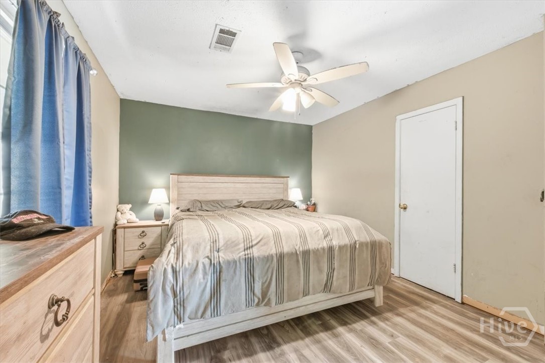 345 West Poplar Street Jesup, GA 31545 - Photo 22 of 31 Primary Bedroom