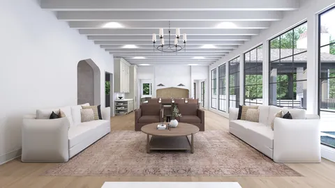 a living room with furniture chandelier and a large window