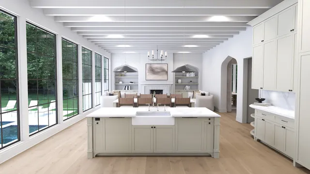 a room with kitchen island a sink and a large window