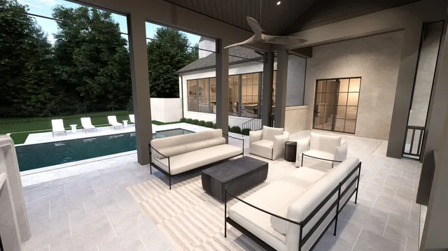 a very nice looking dining room with a large window and chandelier