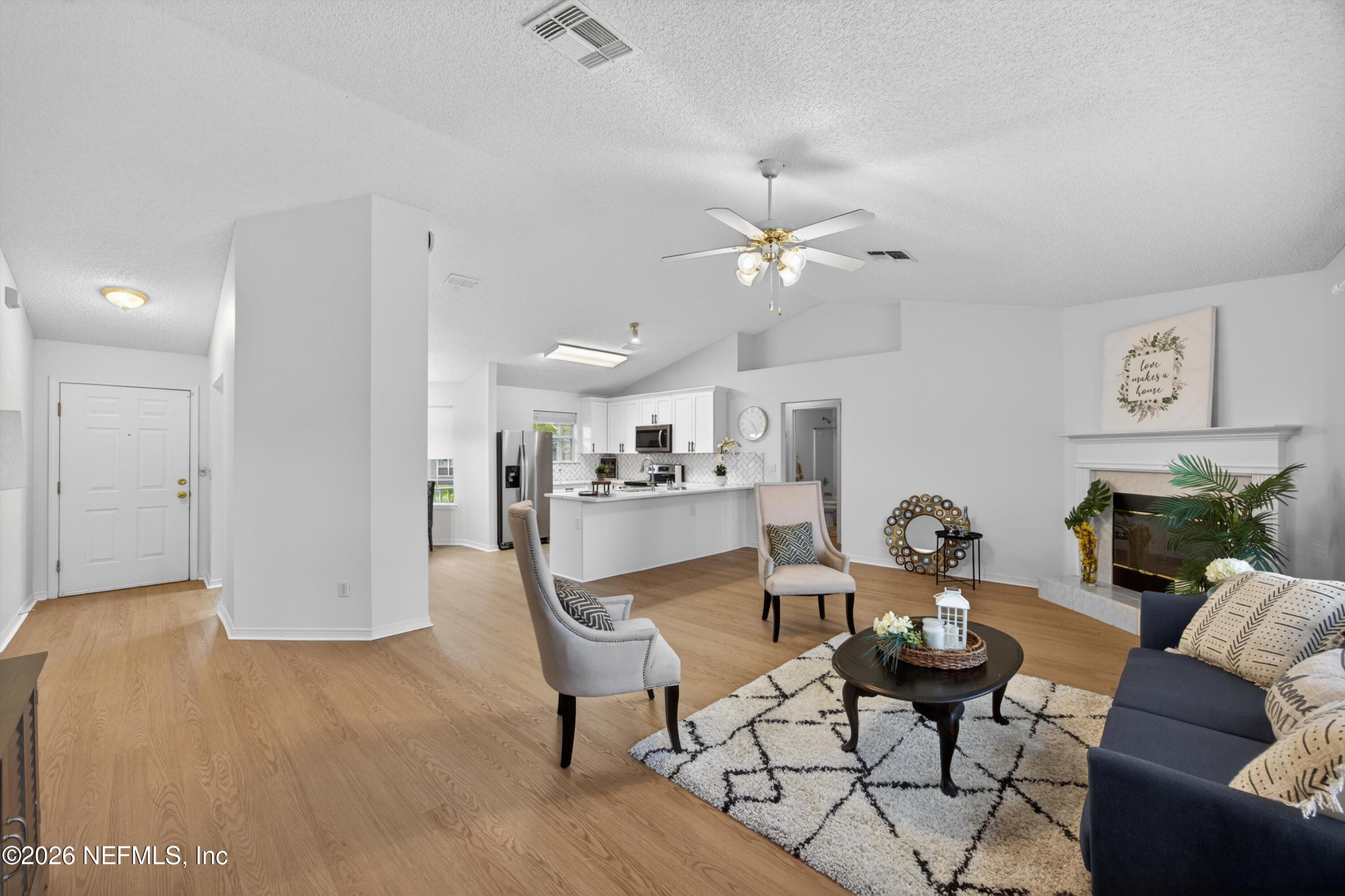2411 Paris Mill Road Jacksonville, FL 32221 - Photo 2 of 36 a view of a dining room with furniture