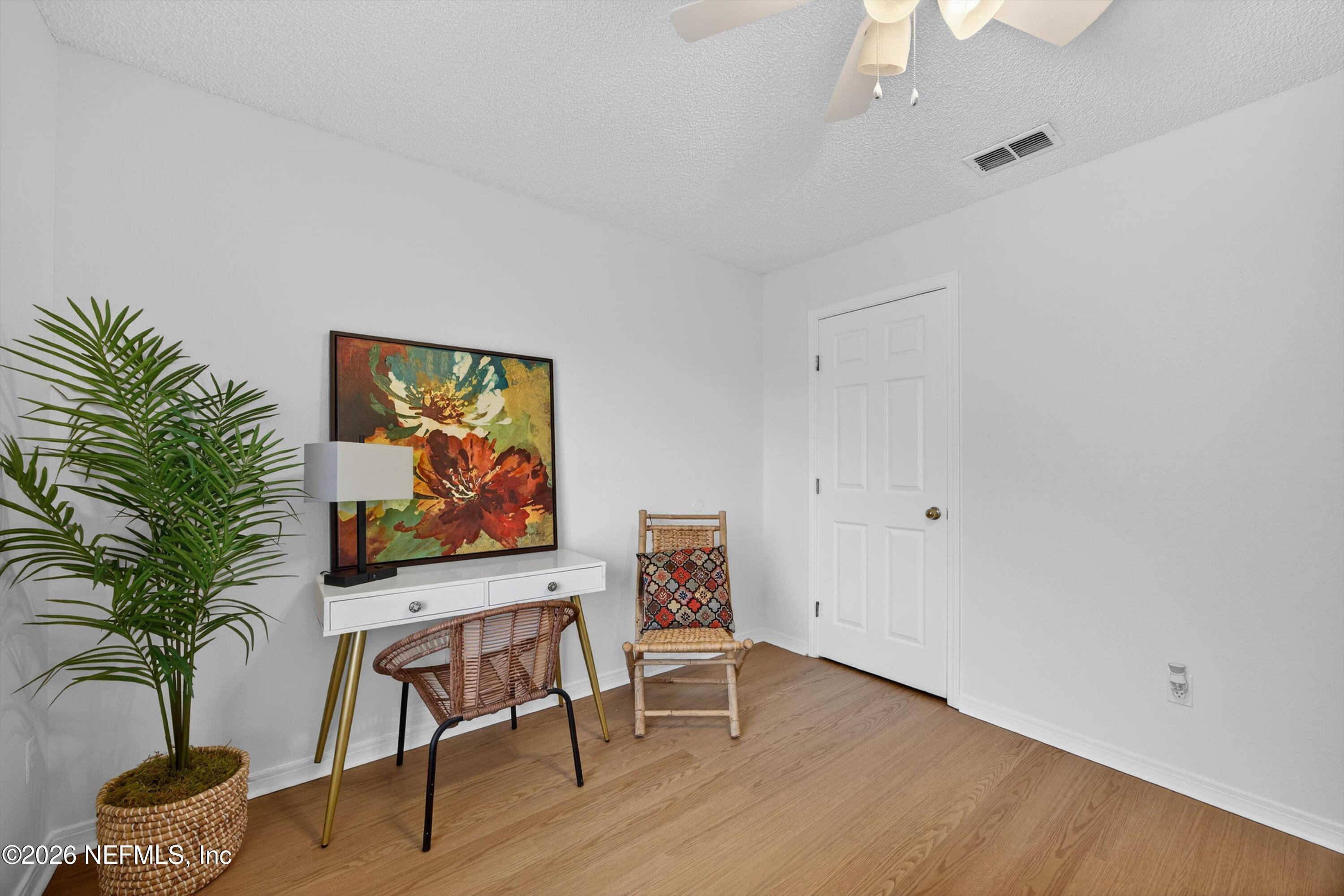 2411 Paris Mill Road Jacksonville, FL 32221 - Photo 22 of 36 a workspace with furniture and potted plant