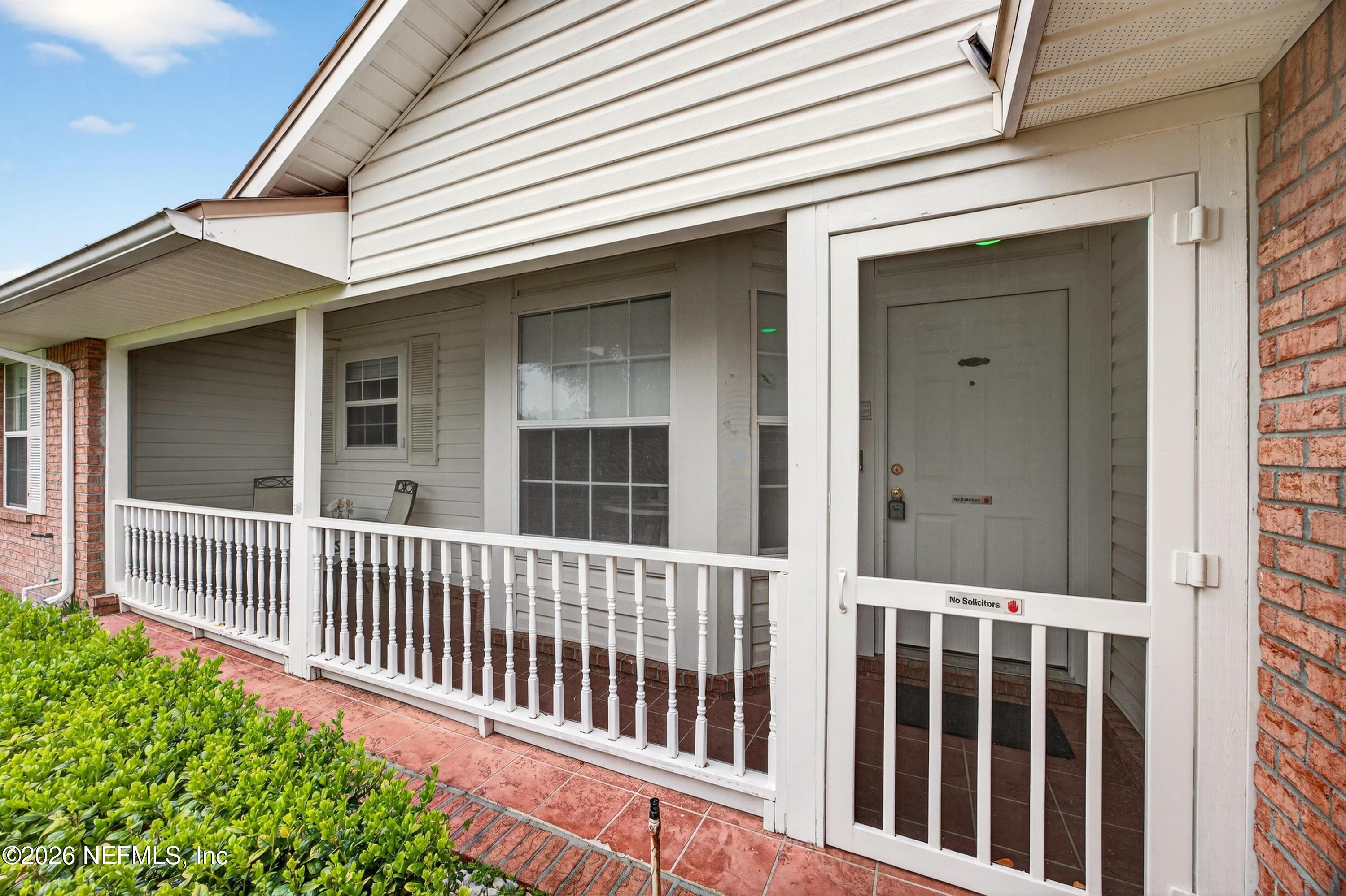 2411 Paris Mill Road Jacksonville, FL 32221 - Photo 36 of 36 a view of a house with a small window