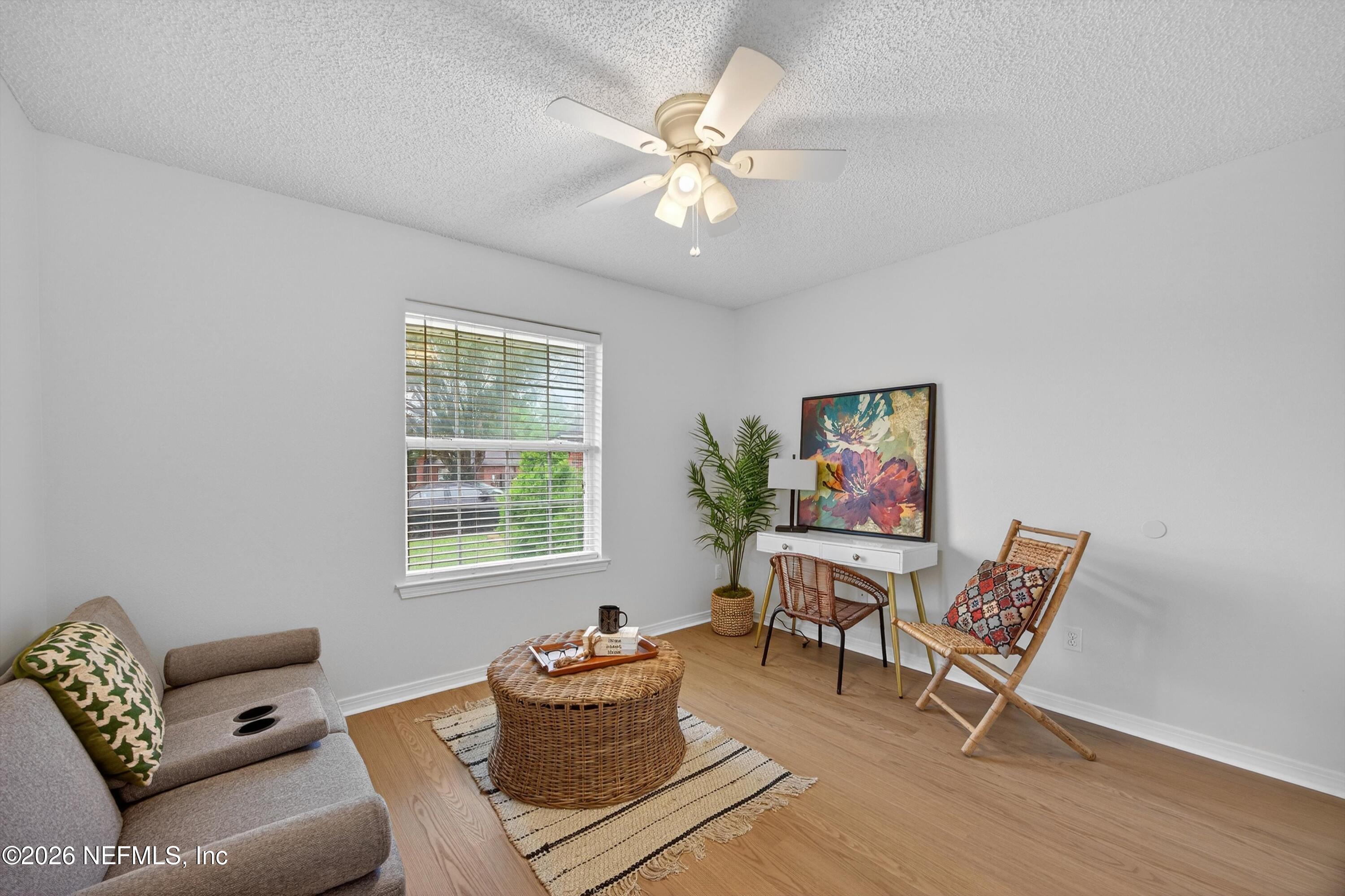 2411 Paris Mill Road Jacksonville, FL 32221 - Photo 7 of 36 a living room with furniture and a window