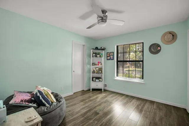 a view of livingroom with furniture and windows