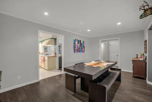 a room with furniture and wooden floor