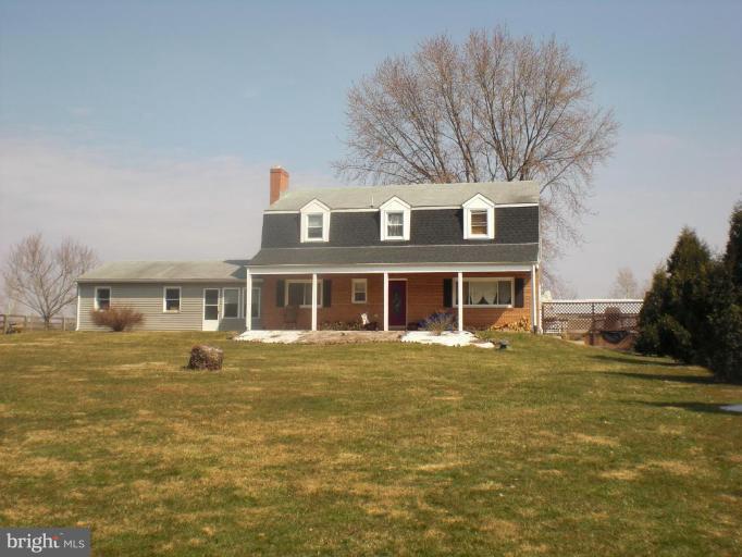 12443 Legore Road Keymar, MD 21757 - Photo 1 of 1 a front view of a house with a yard