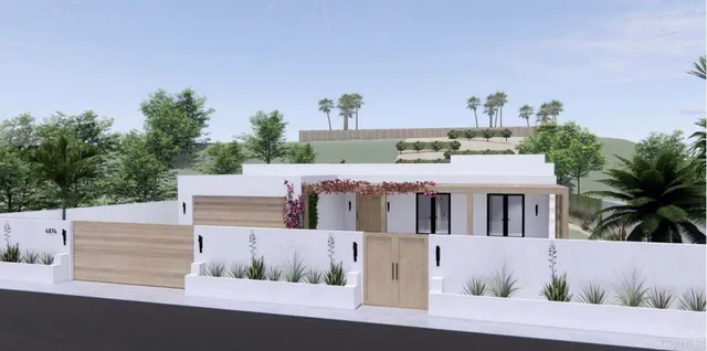 a view of house with outdoor space and seating area