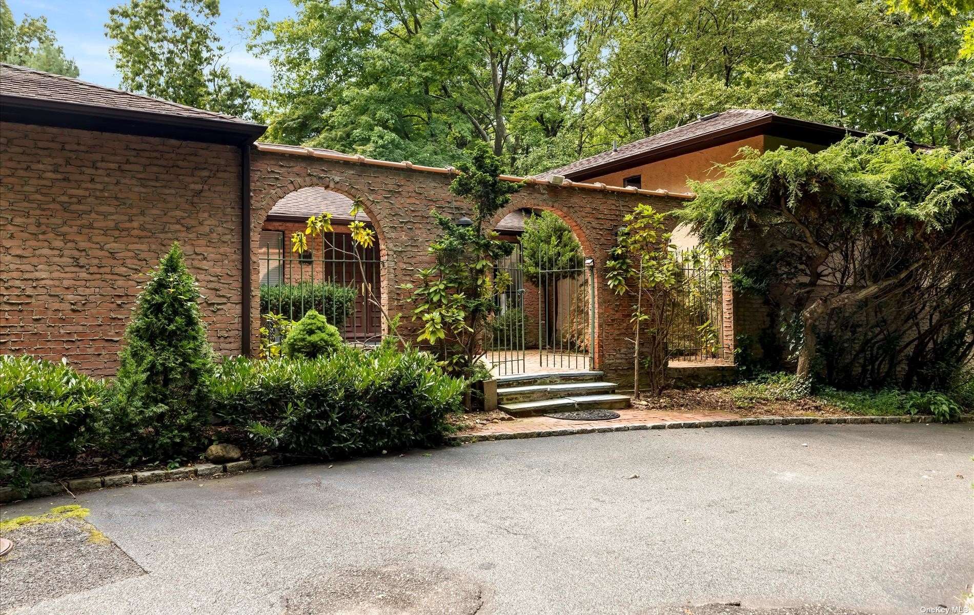 2 Split Rock Road Muttontown, NY 11732 - Photo 1 of 1 a view of house with a small garden