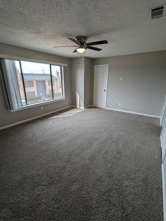 514 East Belt Line Road, Unit B13 DeSoto, TX 75115 - Photo 18 of 28 a view of an empty room with a window