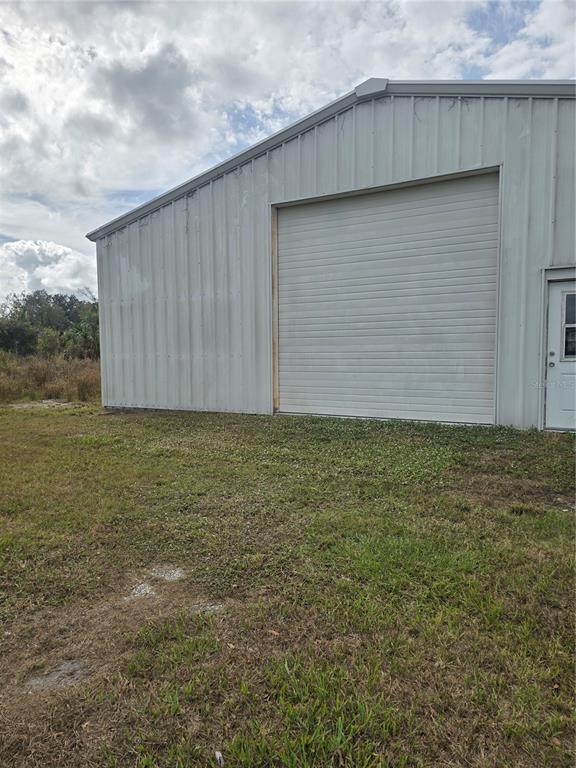 9548 Southwest Falcon Avenue Arcadia, FL 34269 - Photo 45 of 47 a backyard of a house