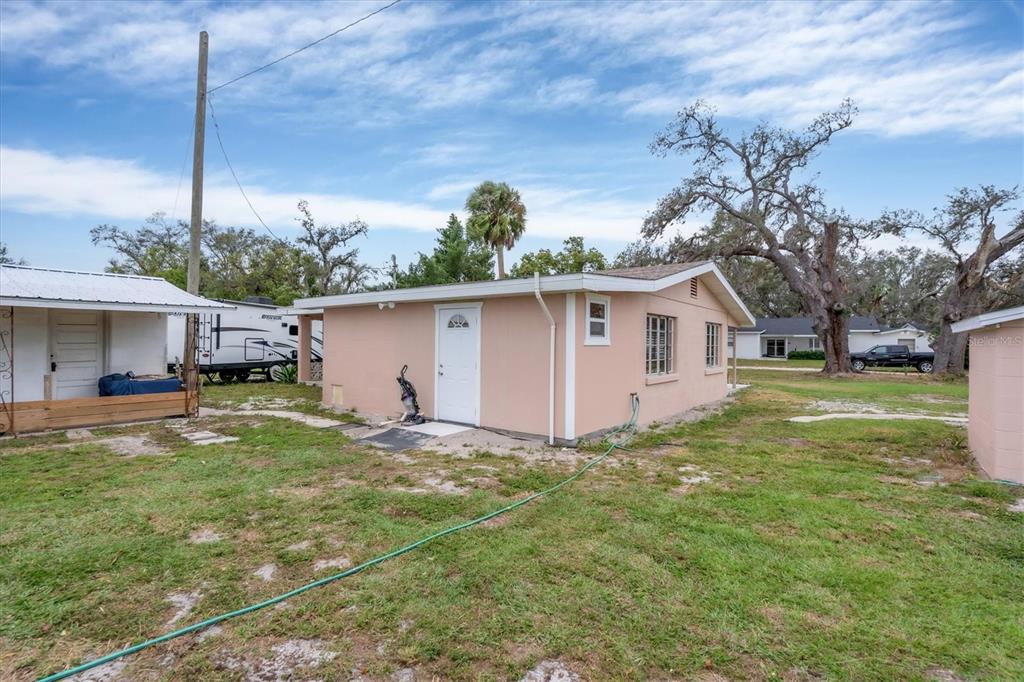 9548 Southwest Falcon Avenue Arcadia, FL 34269 - Photo 8 of 47 a house view with a garden space