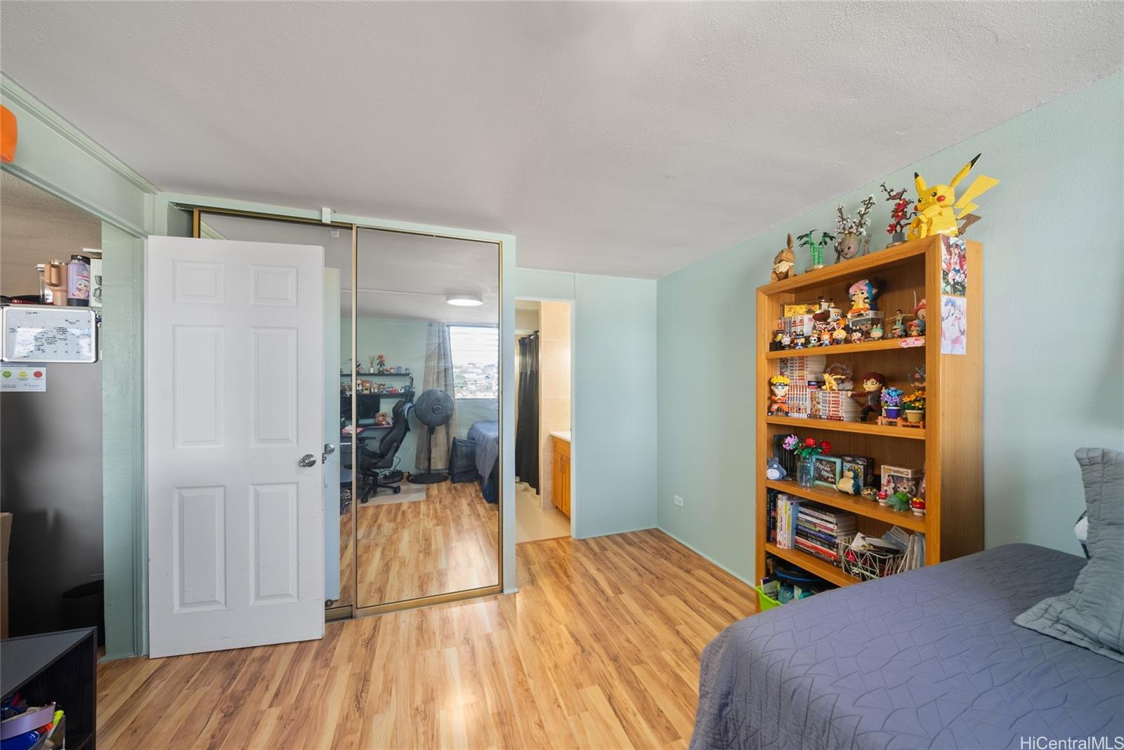 3215 Ala Ilima Street, Unit A510 Honolulu, HI 96818 - Photo 10 of 14 a bedroom with a bed and a view of bedroom