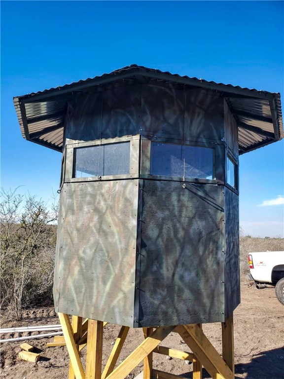 449 Double Eagle Road George West, TX 78022 - Photo 11 of 15 a view of balcony with wooden floor and city view