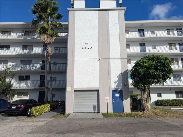 a view of a street with a building
