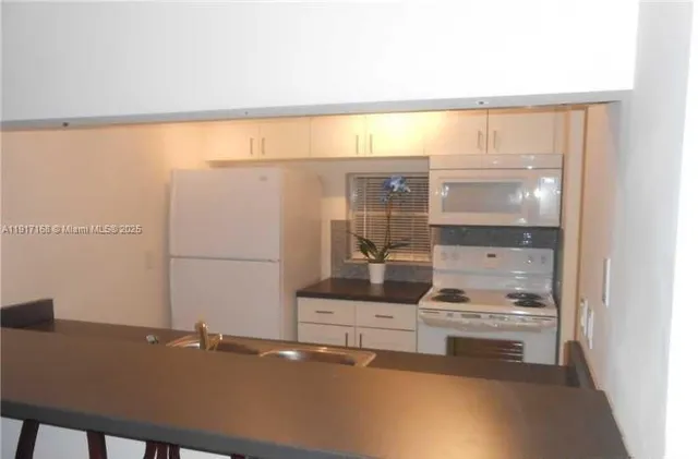 a close view of appliances and cabinets