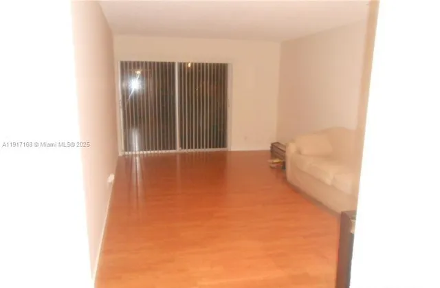 a bathroom with a sink toilet vanity and bathtub