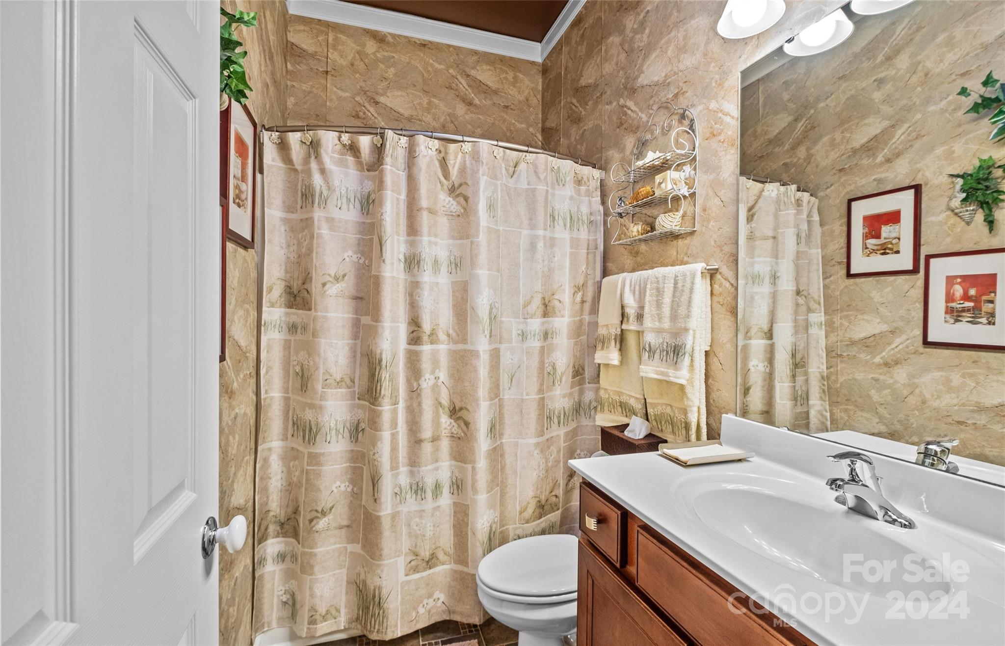 978 Platinum Drive Fort Mill, SC 29708 - Photo 11 of 48 a bathroom with a sink a toilet and shower curtain