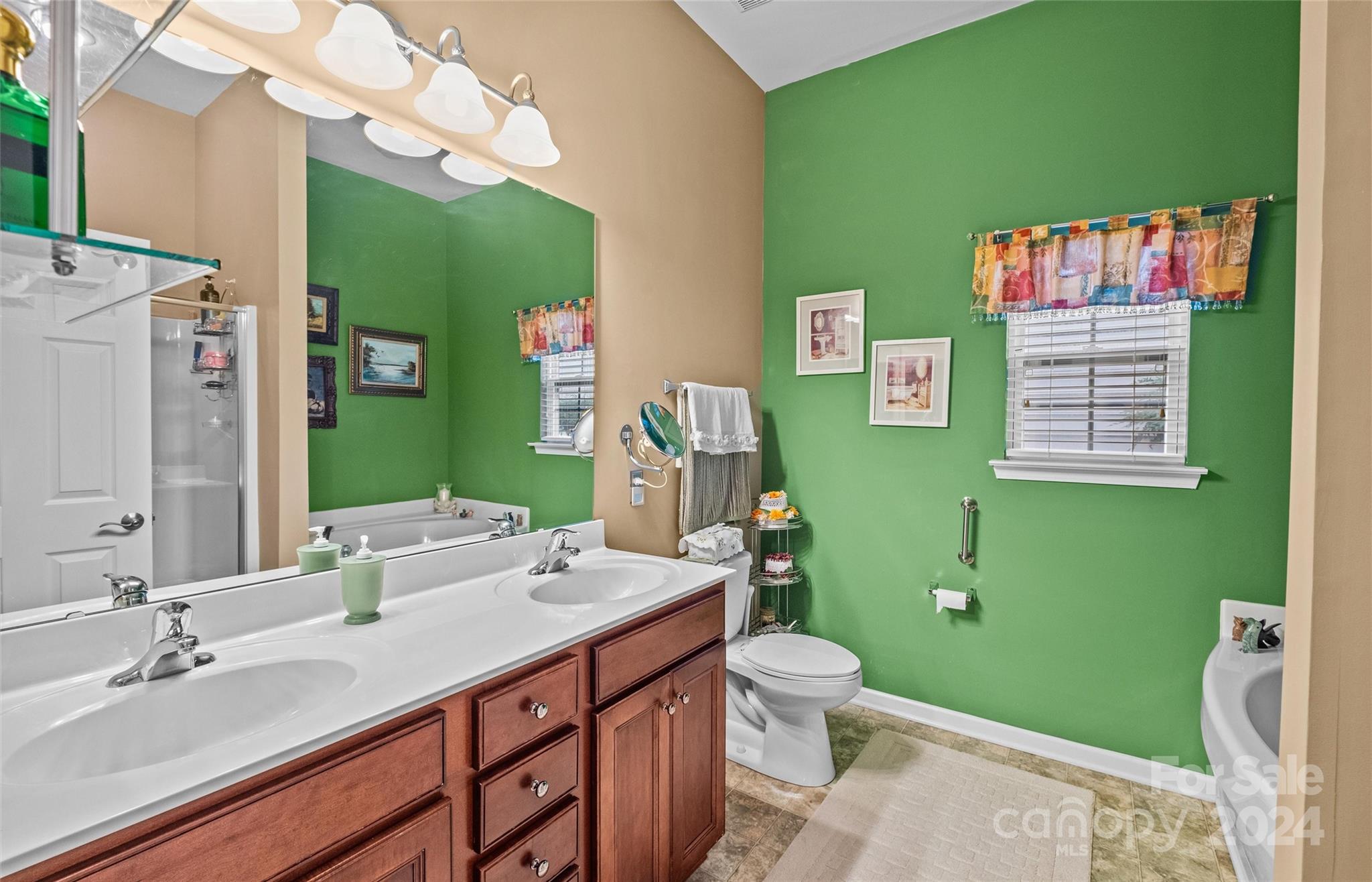 978 Platinum Drive Fort Mill, SC 29708 - Photo 15 of 48 a bathroom with a sink vanity and a mirror