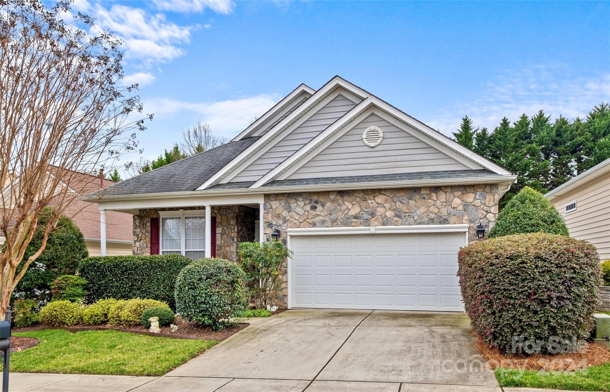 978 Platinum Drive Fort Mill, SC 29708 - Photo 2 of 48 a front view of a house with garden