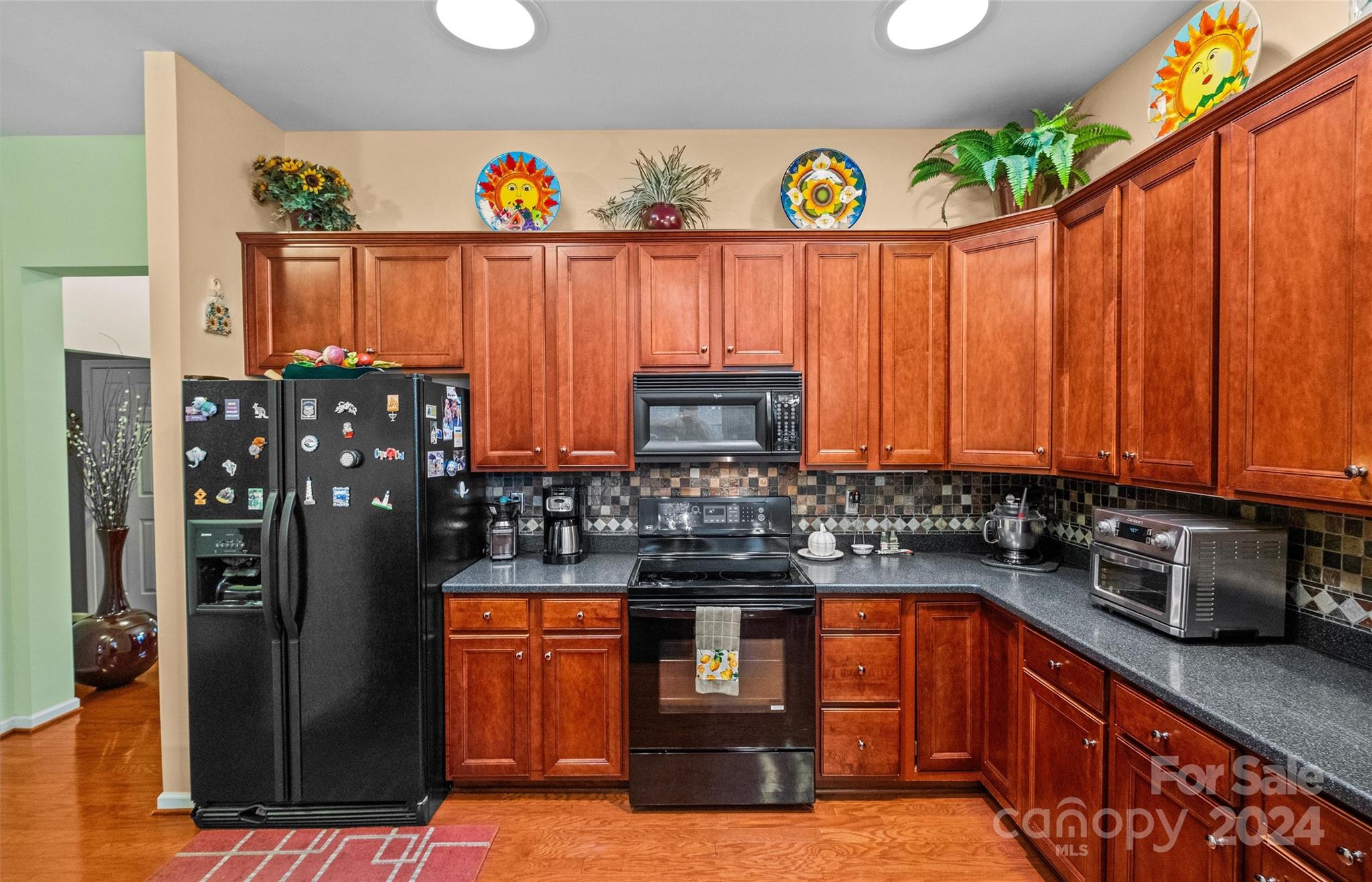 978 Platinum Drive Fort Mill, SC 29708 - Photo 22 of 48 a kitchen with stainless steel appliances granite countertop a refrigerator and a sink