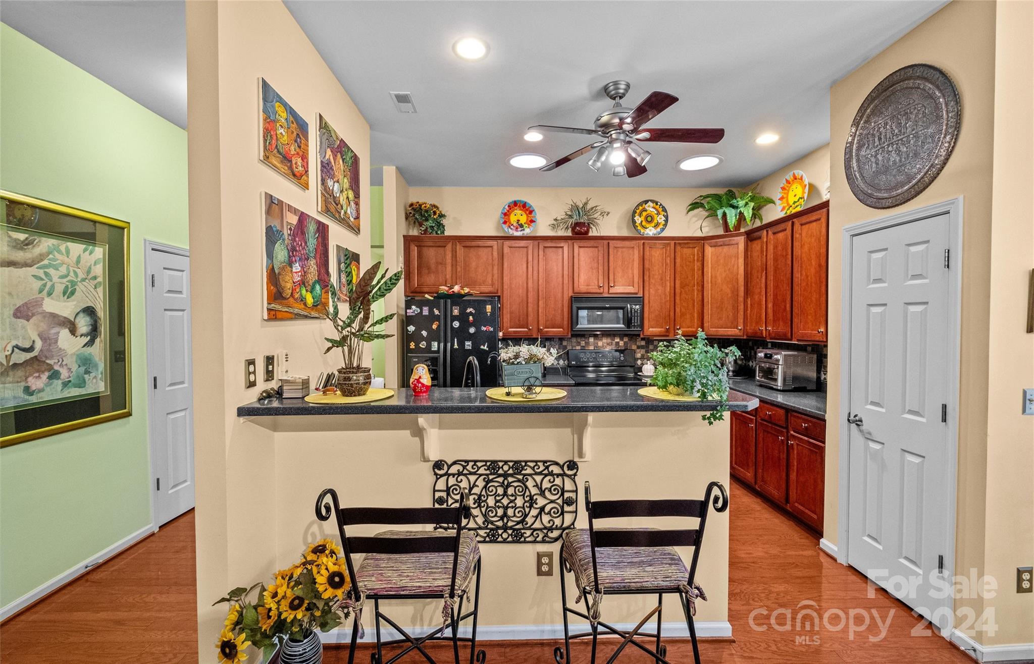 978 Platinum Drive Fort Mill, SC 29708 - Photo 24 of 48 a kitchen with stainless steel appliances granite countertop a sink and a refrigerator