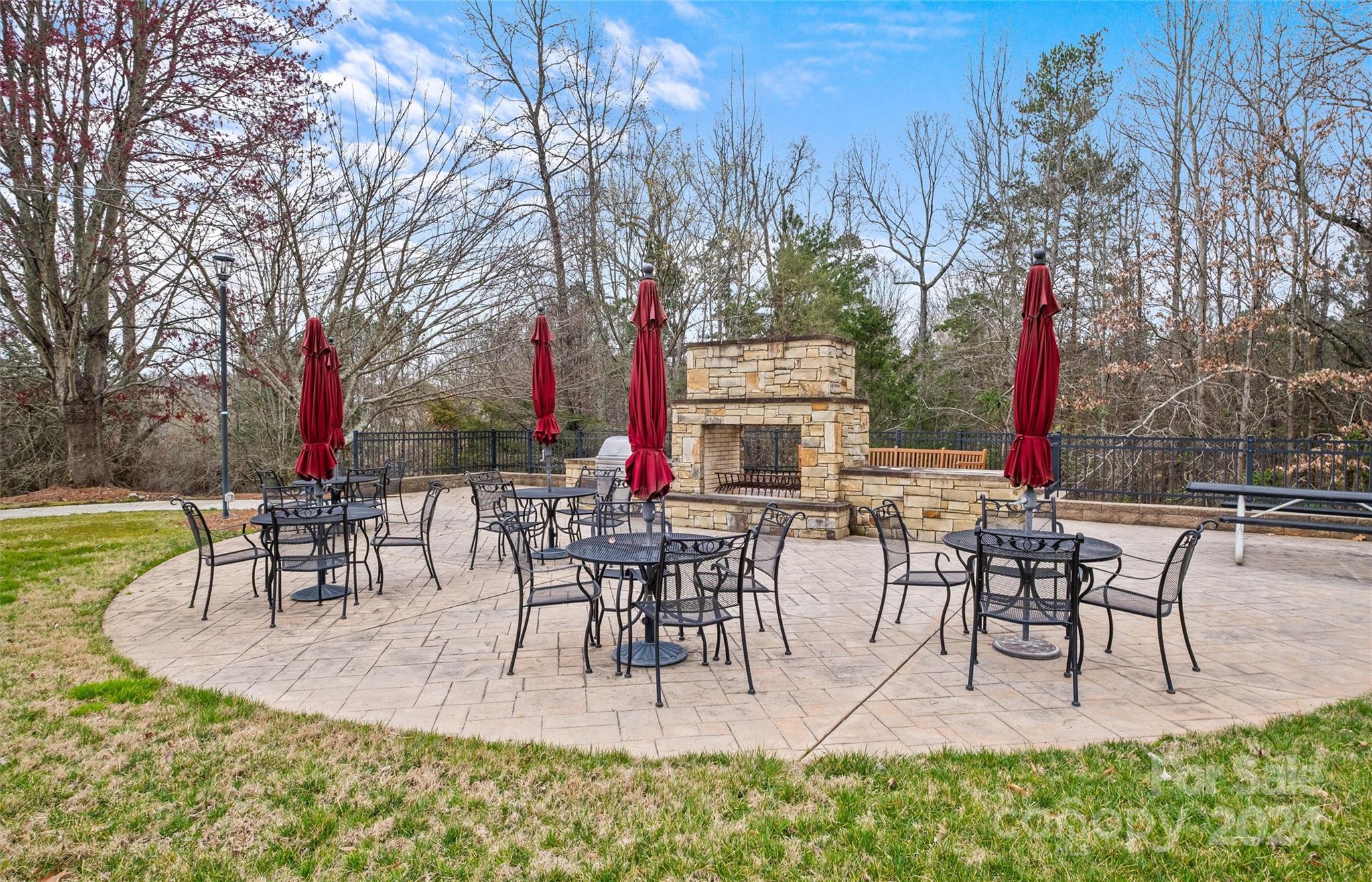 978 Platinum Drive Fort Mill, SC 29708 - Photo 46 of 48 a view of a patio with dining table and chairs